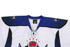 A blue and white ice hockey jersey with a lace-up collar and a logo on the front.
