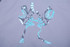 A grey sports jumper featuring a stylised design in blue tones and a logo.