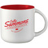 A ceramic mug with a white exterior and red interior, featuring a logo on the side.