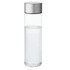A drink bottle in transparent glass with a silver metallic lid, holding clear water inside.