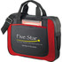 A red and black laptop briefcase with handles, a shoulder strap, and a front pocket holding a notepad.