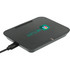 A black wireless charging phone stand with a logo and a charging cable connected.