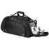 A black duffel bag with a zippered compartment displaying a pair of white sneakers. The bag features a logo.