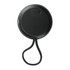 A black Bluetooth speaker with a textured surface, featuring a looped strap and a small input section.