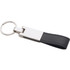 A silver key ring with a black faux leather strap and a shiny metal attachment.
