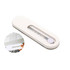 A white smartphone strap with a transparent section and a small circular button, designed for phone stands.