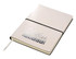 A white A5 notebook with a black elastic band and a logo printed on the cover. It has a ribbon bookmark inside.
