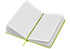 A green and white notebook with lined pages, partially opened to display its interior, featuring a ribbon bookmark.