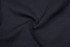 A close-up of black fabric with a swirling texture, showcasing a smooth and versatile material.