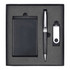 A black gift set including a power bank, USB drive, and a pen, neatly displayed in a black box.