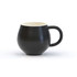 A black mug with a rounded shape and a handle, featuring a contrasting interior colour. It has a logo on the surface.