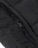 A close-up of a black insulated puffer vest featuring a zipper and quilted fabric texture.