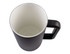 A water pitcher with a matte black exterior and a ceramic-lined interior, featuring a handle and a sleek design.