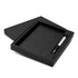 A black notebook and pen set displayed in a rectangular box, featuring a simple design and a logo.