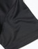 A close-up of a black jacquard knit fabric, highlighting the texture and stitching details of a polo shirt.