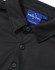 A black short-sleeve polo with a textured jacquard knit and a collar, featuring buttons and a tag with branding.