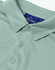 A light green sustainable jacquard knit short-sleeve polo shirt featuring a collar and buttons, with a logo.