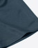 A close-up of a dark blue fabric featuring a jacquard knit pattern. The image highlights the texture and stitching details.