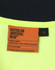 A bright yellow safety polo shirt with a dark collar, featuring a logo and a care label inside.