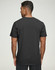 A black premium cotton short-sleeve tee shirt displayed on a model from the back. The shirt features a logo.