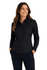 A long sleeve button-up shirt in black, featuring a fitted design and a collar. The model is smiling.