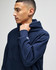 A navy blue Champion Reverse Weave® adult pullover hooded sweatshirt with a logo on the sleeve.