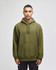 An olive green pullover hooded sweatshirt with a front pocket and a logo on the sleeve.