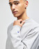 A grey Champion Reverse Weave® adult crew sweatshirt, featuring a small logo on the sleeve.
