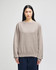A beige Champion Reverse Weave® adult crew sweatshirt with a relaxed fit and a logo on the sleeve.