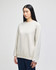 A light beige adult crewneck sweatshirt with a relaxed fit and a small logo.