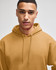 A mustard-coloured pullover hooded sweatshirt with a drawstring and a logo.