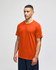 An orange short sleeve t-shirt for adults, featuring a logo on one sleeve.
