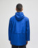 A blue Champion Adult Full-Zip Anorak Jacket viewed from the back, featuring a hood and a logo.