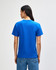 A blue heavyweight cotton unisex T-shirt shown from the back, featuring a simple design and casual fit.