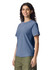 A blue heavyweight adult T-shirt on a model. The shirt features short sleeves and a relaxed fit.