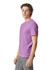 A purple heavyweight t-shirt displayed on a model, featuring a round neckline and short sleeves. The shirt has a logo.