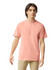 A short-sleeved, coral heavyweight T-shirt on a model, featuring a classic round neckline and no visible logos.