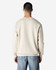 A cream-coloured Gildan Heavy Blend adult crewneck sweatshirt, featuring a logo, displayed from the back.
