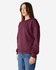 A burgundy Gildan Heavy Blend adult crewneck sweatshirt displayed on a model, featuring a simple design.
