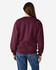 A maroon Gildan Heavy Blend adult crewneck sweatshirt with a simple design, featuring a logo.