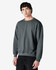A grey Gildan Heavy Blend adult crewneck sweatshirt with a relaxed fit and long sleeves, featuring a logo.
