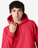 A red hooded sweatshirt featuring a front pocket and a hood, worn by a model with dark hair.