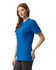 A unisex fine jersey short sleeve t-shirt in bright blue, featured on a model standing sideways.