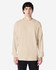 A long sleeve t-shirt in beige worn by a model, featuring a relaxed fit and a branding logo.