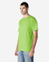 A green adult t-shirt displayed on a male model, featuring a simple design and a logo on the front.