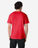 A red Gildan Heavy Cotton adult T-shirt displayed from the back on a model wearing black pants.