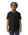 A black Gildan Heavy Cotton Youth T-Shirt displayed on a smiling child. The shirt features short sleeves and a basic cut.