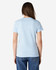 A light blue Gildan Softstyle ladies' t-shirt is displayed from the back, featuring a standard fit and short sleeves.