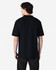 A black adult polo shirt with a double pique design, featuring short sleeves and a collar. There is a logo on the shirt.