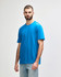 A blue Gildan Softstyle adult midweight t-shirt featured on a model against a plain background.